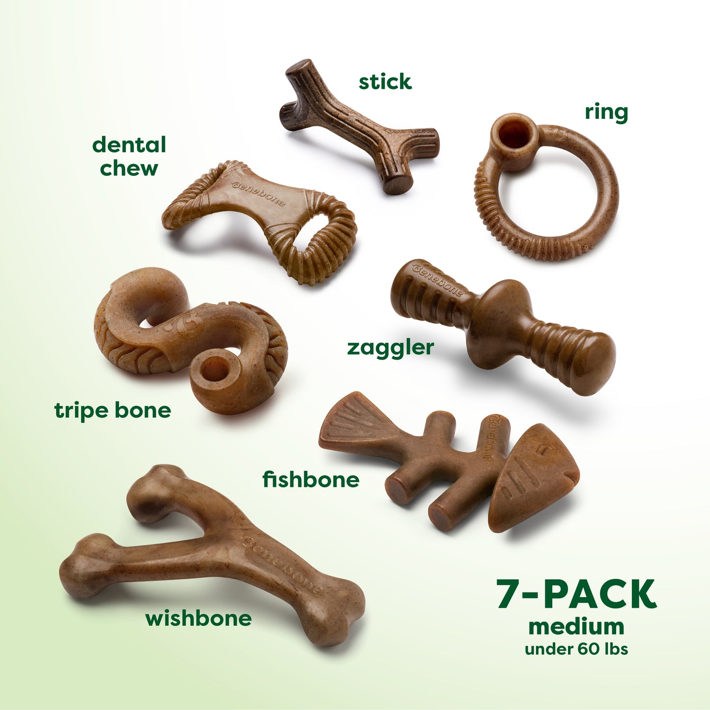 Seven uniquely shaped brown nylon dog chews from Benebone’s Complete Chew Collection are shown on a white background, each labeled: dental chew, tripe bone, wishbone, stick, zaggler, ring, fishbone. Text: 7-PACK medium under 60 lbs.