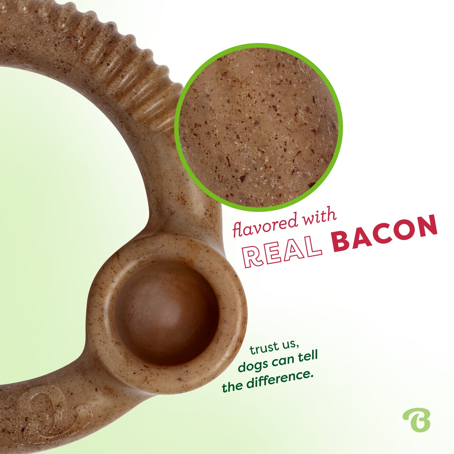 Flavored with real bacon. Trust us, dogs can tell the difference. Close up of Benebone bacon ring.
