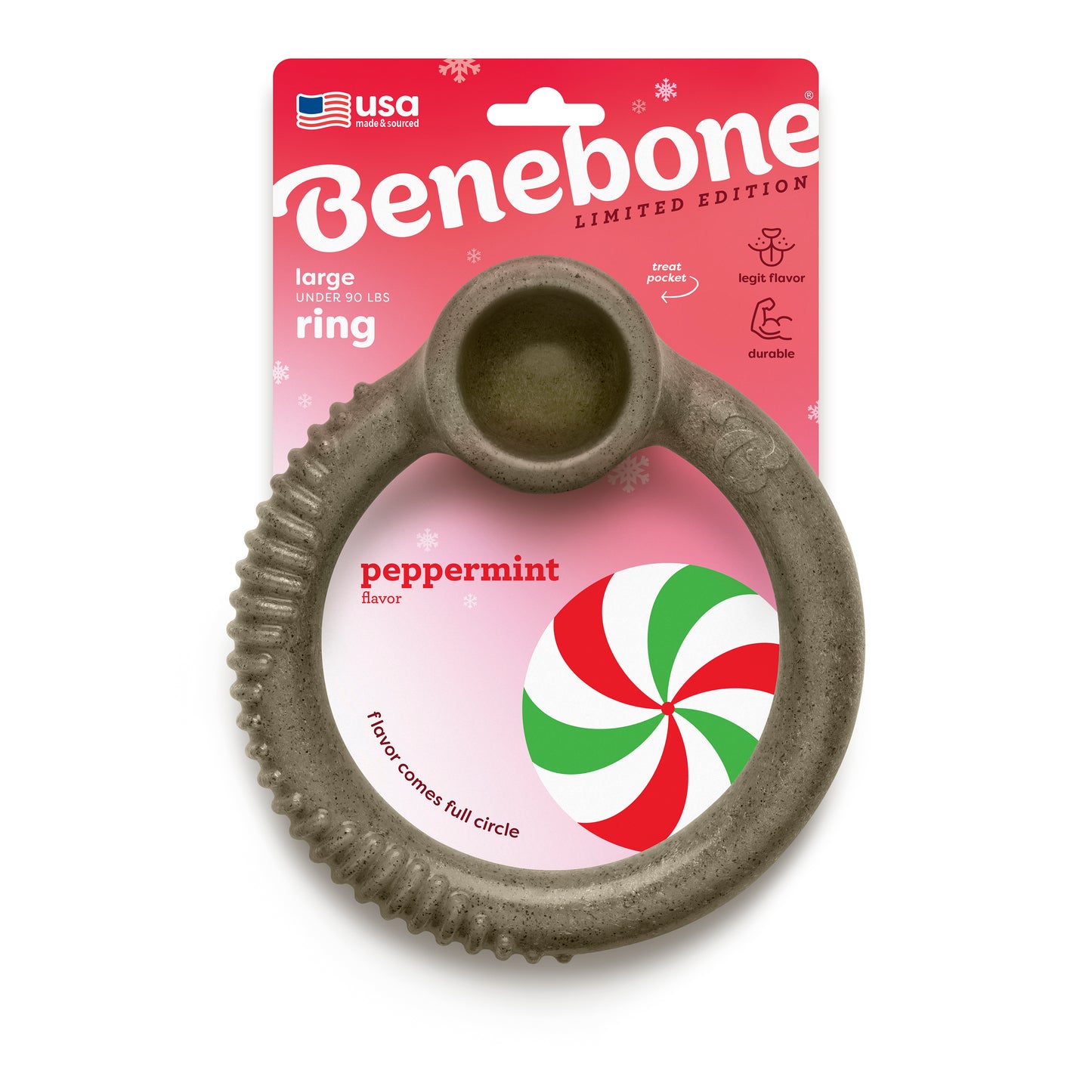 A gray, circular Benebone Peppermint Ring dog chew is attached to festive red and white packaging labeled Benebone Limited Edition, featuring peppermint flavor highlights and a peppermint candy illustration.