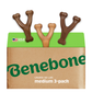 Three brown, Y-shaped Benebone Wishbone Trio (3-Pack) chew toys extend from a tan and green package marked “UNDER 60 LBS medium.” A small USA flag icon highlights these durable Benebone dog toys in the top left corner.