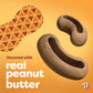 The Benebone Tongue Twister & Treat Pod 2-Pack features two peanut-shaped treats with hollow centers on an orange background, accompanied by a graphic of a peanut and the text “flavored with real peanut butter”—making them perfect as a peanut butter treat or for filling inside your dog’s favorite durable dog toy.