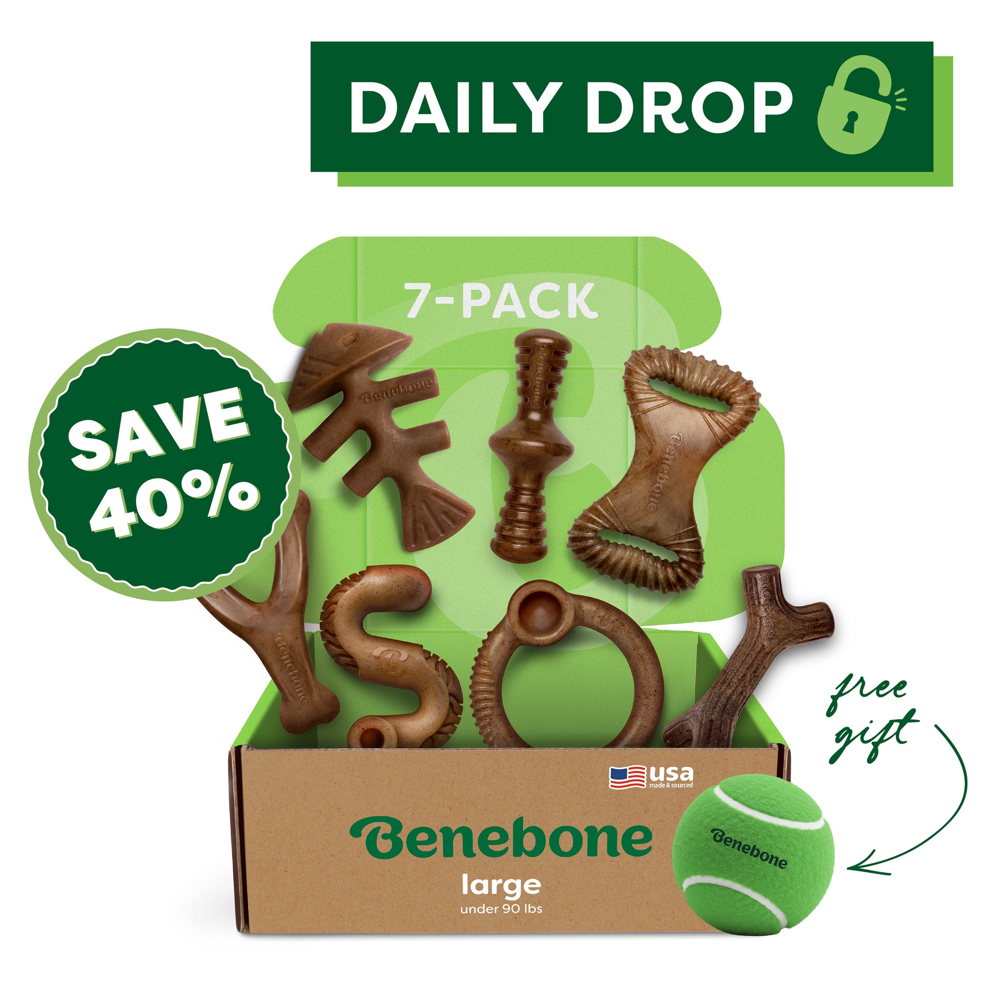 Open cardboard box labeled “Benebone Complete Chew Collection (7-Pack)” contains seven durable dog chew toys in assorted shapes. Includes a free green tennis ball. “Save 40%” and “Daily Drop” text appear at the top. Brand: Benebone.
