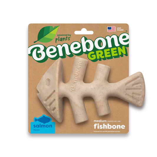 The Benebone Green Fishbone is a beige, salmon-flavored dog toy in fishbone shape, packaged in eco-friendly material with green text, a leaf graphic, and a Made in USA flag icon.