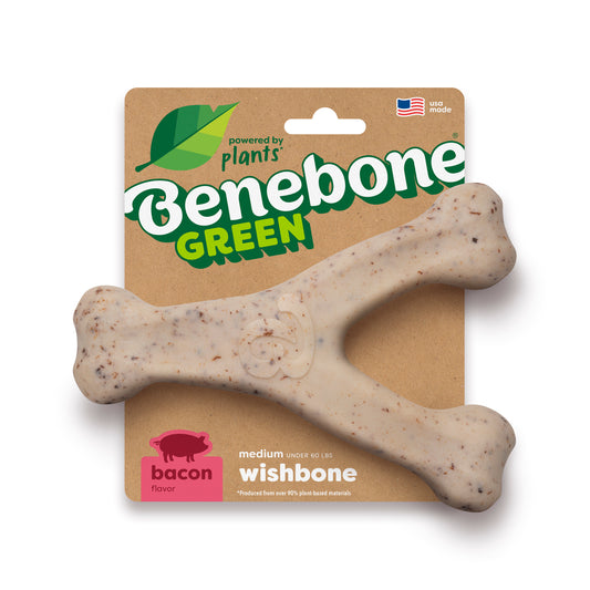 The Benebone Green Wishbone is a beige, Y-shaped, plant-based chew toy for medium dogs under 60 lbs. Bacon infused and made in the USA, it features green labeling with flavor info on the pack.