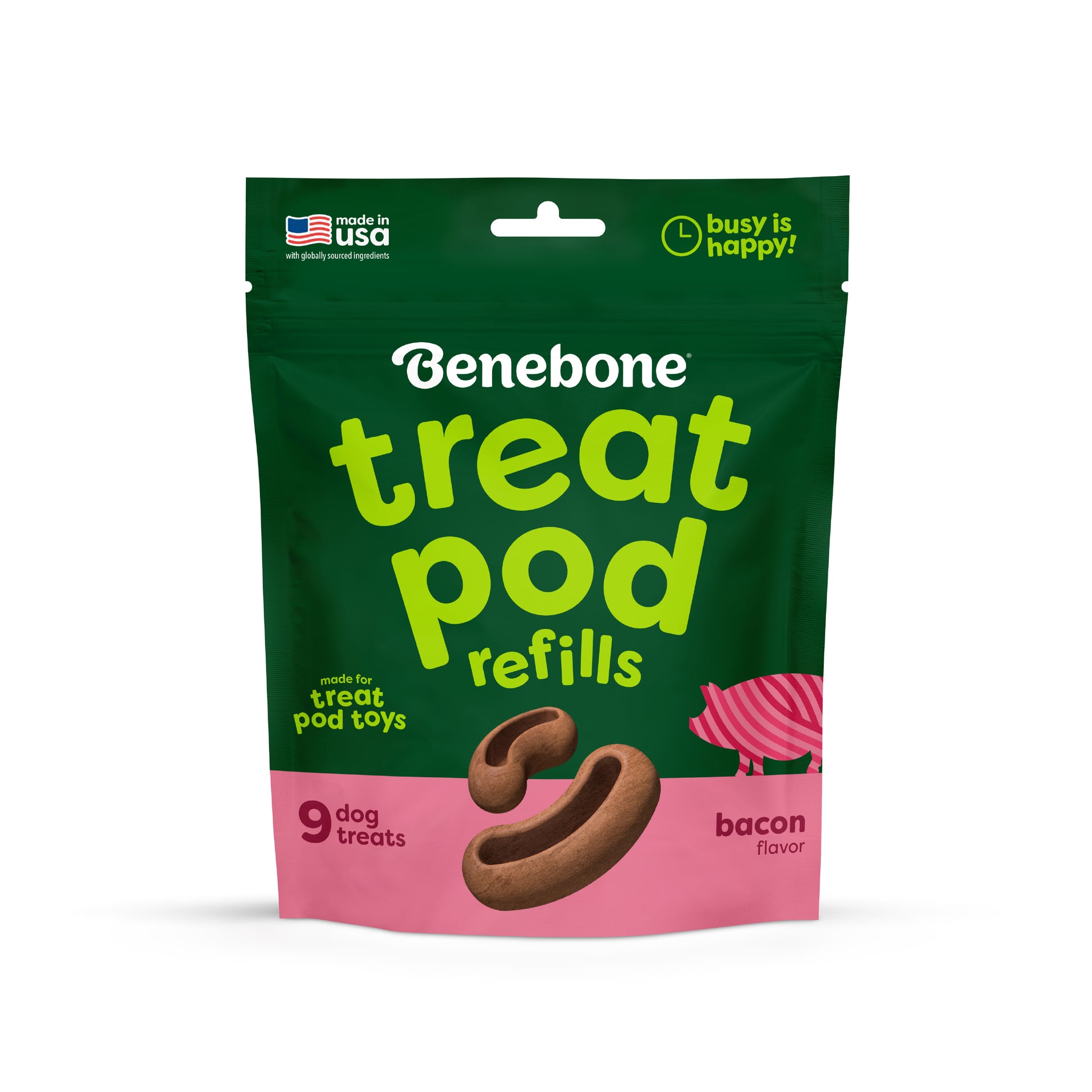 A green and pink bag of Benebone Treat Pod for Tongue Twister, bacon flavor, contains 9 delicious dog treats specially designed for interactive dog toys. The packaging features images of the treats and a playful pig illustration, and is proudly labeled made in the USA.