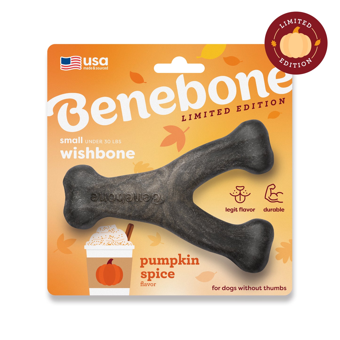 The Benebone Pumpkin Spice Wishbone is a wishbone-shaped chew toy for small dogs under 30 lbs, featuring autumn-themed packaging with leaves and a pumpkin spice drink to celebrate the festive season.