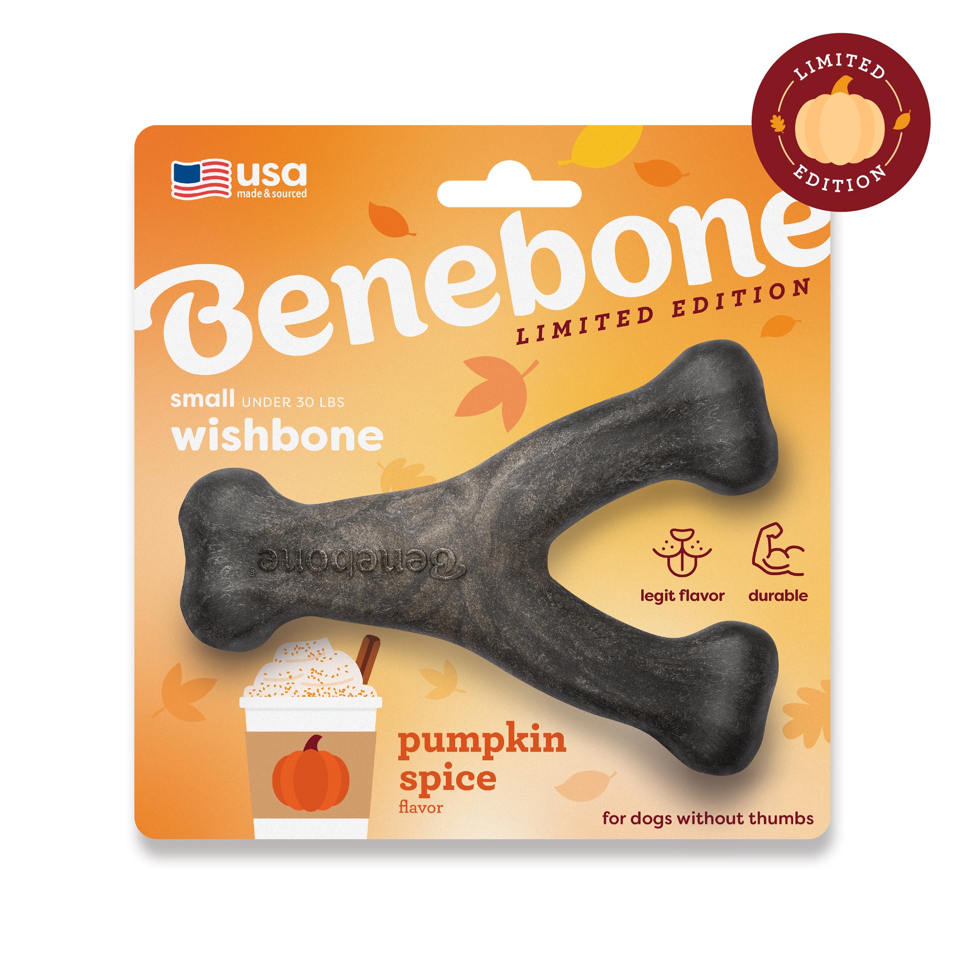 The Benebone Pumpkin Spice Wishbone is a wishbone-shaped chew toy for small dogs under 30 lbs, featuring autumn-themed packaging with leaves and a pumpkin spice drink to celebrate the festive season.